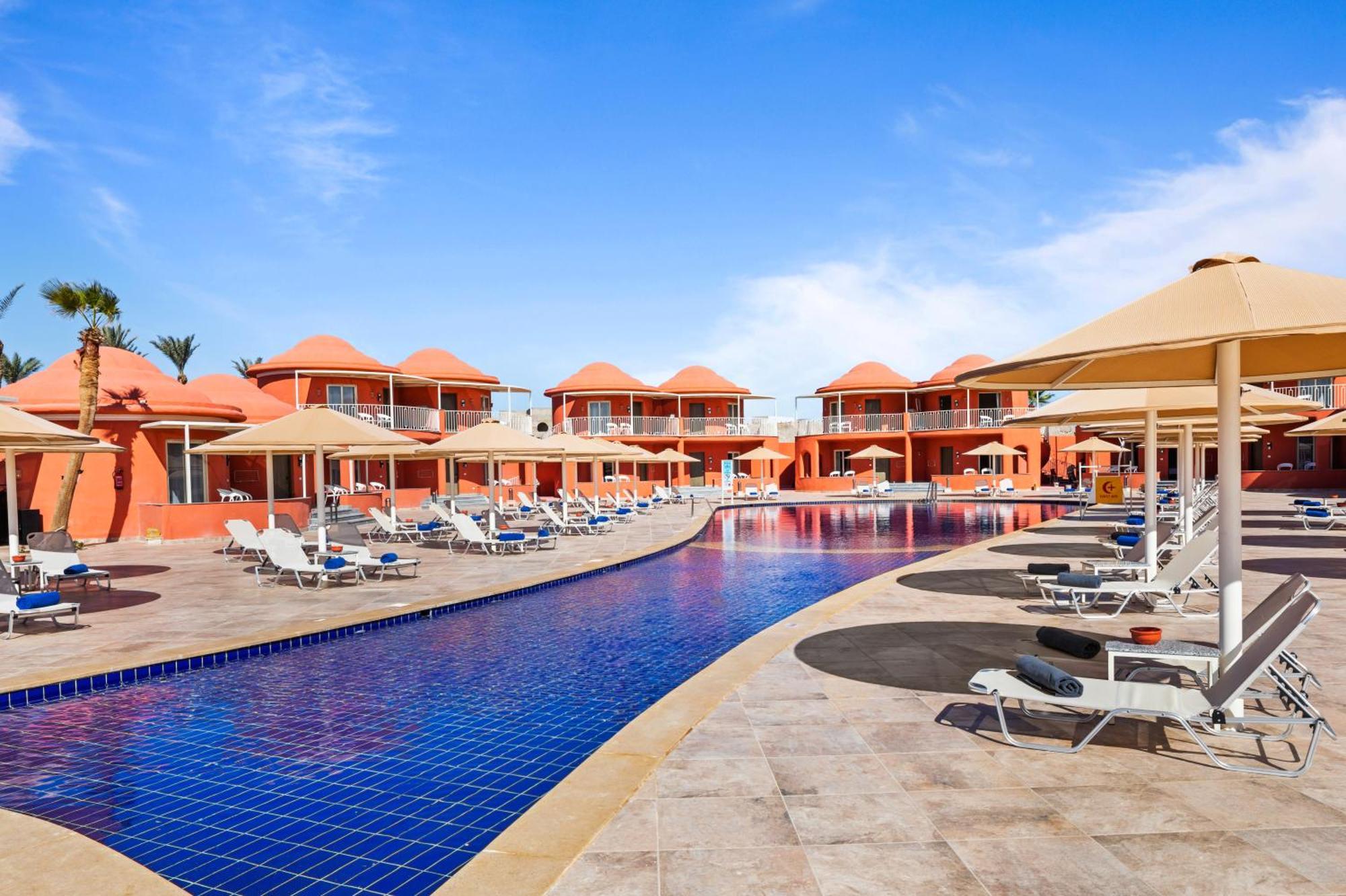 Pickalbatros Laguna Club Resort Sharm El Sheikh Exterior foto The swimming pool at the Iberostar Grand Hotel Bávaro