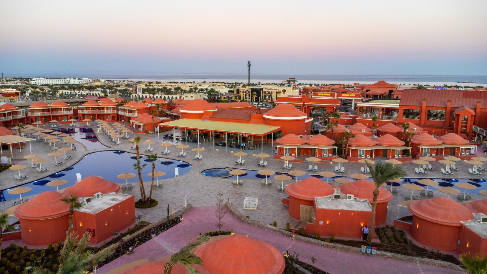 Pickalbatros Laguna Club Resort Sharm El Sheikh Exterior foto Sunset at the Hilton Sharm El Sheikh